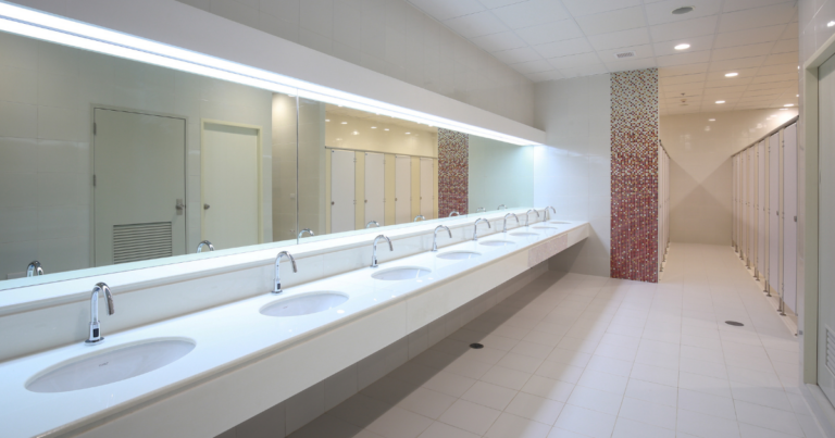 Commercial bathroom after a cleaning done by experts. Pristine and sanitized.